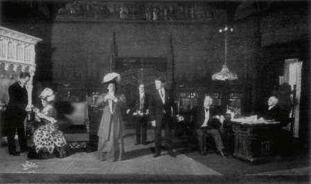 [Photo, from the play, of the Ryder household
as Jefferson is introduced to Miss Green.]