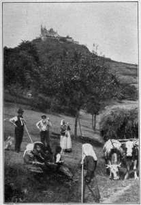 Copyright by Underwood & Underwood, N. Y.
CASTLE HOHENZOLLERN
Ancestral seat of the Hohenzollern dynasty. The men and women in the foreground
are good types of Germany's peasantry.