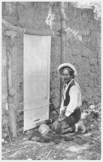 Fig. 42—Rug weaver at Cotahuasi. The industry is limited
to a small group of related families, living in the Cotahuasi Canyon
near Cotahuasi. The rugs are made of alpaca wool. Pure black, pure
white, and various shades of mixed gray wool are employed. The result is
that the rugs have “fast” colors that always retain their original
contrasts. They are made only to order at the homes of the purchasers.
The money payment is small, but to it is added board and lodging,
besides tobacco, liqueurs, and wine. Before drinking they dip their
finger-tips in the wine and sprinkle the earth “that it may be
fruitful,” the air “that it may be warm,” the rug “that it may turn out
well,” and finally themselves, making the sign of the cross. Then they
set to work.