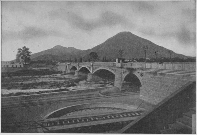 STONE BRIDGE OVER THE RIMAC RIVER, LIMA, PERU.